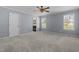 Spacious bedroom with two windows and a ceiling fan at 48 Arlington Dr, Cameron, NC 28326