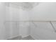 A well-organized walk-in closet with white wire shelving and carpet flooring offers ample storage space at 48 Arlington Dr, Cameron, NC 28326
