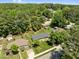 An aerial view of a charming neighborhood with tree-lined streets and well-maintained homes at 5208 Melbourne Rd, Raleigh, NC 27606