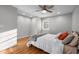 Bedroom features recessed lights, ceiling fan, and large window at 5208 Melbourne Rd, Raleigh, NC 27606