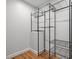 Walk-in Closet features metal racking to organize your clothes and shoes at 5208 Melbourne Rd, Raleigh, NC 27606