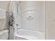 Clean bathroom with shower-tub combination and decorative tree shower curtain adding a touch of style at 524 Clarenbridge Dr, Cary, NC 27519