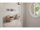 Cozy bedroom featuring two chairs and round window providing natural light and a view at 524 Clarenbridge Dr, Cary, NC 27519