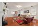 Spacious living room with hardwood floors, fireplace, breakfast bar and lots of seating at 524 Clarenbridge Dr, Cary, NC 27519