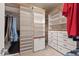 Spacious walk-in closet with built-in shelving, drawers, and ample storage for clothes and accessories at 524 Clarenbridge Dr, Cary, NC 27519