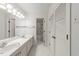 Bathroom featuring double sinks and stand up shower at 5529 Shadowbrook Dr, Raleigh, NC 27612