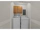 Convenient laundry closet with a side-by-side washer and dryer at 5529 Shadowbrook Dr, Raleigh, NC 27612