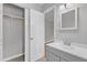The bathroom features a closet, tiled floor, vanity and lighting at 5602 Falls Of Neuse Rd # E, Raleigh, NC 27609