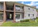 This condo has outdoor living spaces on two levels, with brick accents, privacy fences, and easy access to yard at 5602 Falls Of Neuse Rd # E, Raleigh, NC 27609