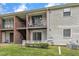 Cozy condo features outdoor living space with a balcony and walk out patio, perfect for relaxing and enjoying the views at 5602 Falls Of Neuse Rd # E, Raleigh, NC 27609