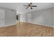 Spacious living room featuring laminate flooring and recessed lighting at 5602 Falls Of Neuse Rd # E, Raleigh, NC 27609