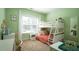 Cozy ' room featuring a bunk bed, desk, and bright, airy window at 65 Wood Green Dr, Wendell, NC 27591
