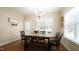 Charming dining room with natural light and neutral colors at 65 Wood Green Dr, Wendell, NC 27591