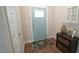 Inviting home foyer with a decorative rug and stylish welcome décor at 65 Wood Green Dr, Wendell, NC 27591