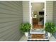 Inviting foyer showcasing a view into the living room and beautiful hardwood floors at 65 Wood Green Dr, Wendell, NC 27591