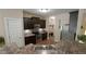 Kitchen features stainless steel appliances, ample cabinets, and a breakfast bar area at 65 Wood Green Dr, Wendell, NC 27591