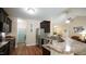 Kitchen with stainless steel appliances, breakfast bar, and an open floor plan at 65 Wood Green Dr, Wendell, NC 27591