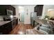 Bright kitchen with stainless steel appliances and a breakfast bar with sink at 65 Wood Green Dr, Wendell, NC 27591