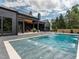 Beautiful backyard pool area, designed for luxury and outdoor enjoyment at 661 Manchester Dr, Raleigh, NC 27609