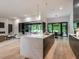 Open-concept kitchen features a large island, seamless access to living and dining areas at 661 Manchester Dr, Raleigh, NC 27609