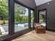 Bright sitting area with view of the pool at 661 Manchester Dr, Raleigh, NC 27609