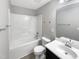 Full bathroom featuring a shower-tub combo and a vanity with a sink at 664 Lavenham Ln, Fuquay Varina, NC 27526