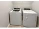 Laundry room showcasing new washer and dryer units at 664 Lavenham Ln, Fuquay Varina, NC 27526