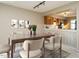 Dining area with a view of the kitchen and a stylish design, perfect for Gathering meals at 7408 Sandy Creek Dr, Raleigh, NC 27615