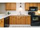 Updated kitchen with stainless steel appliances and ample cabinet space for all your cooking needs at 7408 Sandy Creek Dr, Raleigh, NC 27615