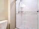 Bathroom shower with white subway tile and mosaic accent at 7408 Sandy Creek Dr, Raleigh, NC 27615