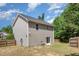 Exterior view of a two-story home featuring a fenced yard and patio area at 776 Averasboro Dr, Clayton, NC 27520