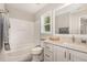 Bathroom featuring a granite countertop and a shower-tub combination at 776 Averasboro Dr, Clayton, NC 27520