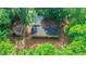Aerial view of the home with a large lot and wooded surroundings at 9614 Quail Roost Rd, Bahama, NC 27503