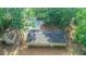 Aerial view of the house with a large backyard and shed at 9614 Quail Roost Rd, Bahama, NC 27503