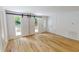 Inviting living room with hardwood floors, natural light, and access to front door and closet at 9614 Quail Roost Rd, Bahama, NC 27503