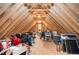 Spacious attic with exposed wood beams and ample storage space at 100 Mill Creek Dr, Fuquay Varina, NC 27526
