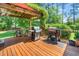 Outdoor kitchen on back deck with grill and space for cooking equipment at 100 Mill Creek Dr, Fuquay Varina, NC 27526