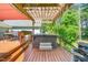Relaxing back deck with hot tub and pergola, perfect for outdoor entertaining at 100 Mill Creek Dr, Fuquay Varina, NC 27526