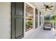 Inviting front porch featuring outdoor seating and a view of the landscaped yard at 100 Mill Creek Dr, Fuquay Varina, NC 27526