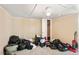 Bedroom space with ample storage area, an open closet, and carpet flooring at 105 E Cole St, Dunn, NC 28334