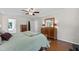 Spacious bedroom with hardwood floors, walk-in closet, and neutral decor at 105 Juniper Ct, Carrboro, NC 27510