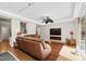 Comfortable living room with a large window and a ceiling fan for relaxing or entertaining at 105 Juniper Ct, Carrboro, NC 27510