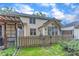 Charming backyard featuring a wood fence, brick patio, and lush greenery for outdoor enjoyment at 11035 Southwalk Ln, Raleigh, NC 27614