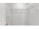 Walk-in closet provides ample storage with wire shelving and a hanging rod at 11035 Southwalk Ln, Raleigh, NC 27614