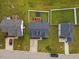 Aerial view of the house, showcasing the fenced backyard, driveway, and proximity to neighborhood at 1104 Cross Creek Dr, Nashville, NC 27856