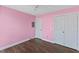 Bedroom with hardwood floors and double door closet at 1104 Cross Creek Dr, Nashville, NC 27856