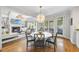 Open concept dining area connecting to the living room, offering a seamless flow for entertaining at 112 Roseberry Way, Holly Springs, NC 27540