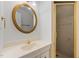 Classic bathroom with a pedestal sink, gold accents, and a glass-enclosed shower at 113 Wilander Dr, Cary, NC 27511