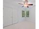 Well-lit bedroom features plush carpet, a ceiling fan, a corner window, and a closet at 113 Wilander Dr, Cary, NC 27511