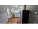 Kitchen featuring white cabinets, stainless steel appliances and wood floors at 1223 Wallace St, Burlington, NC 27215